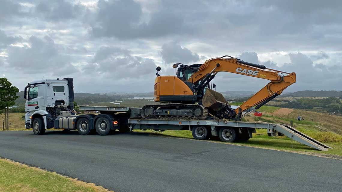 Tulip low loader onsite delivery of CASE digger